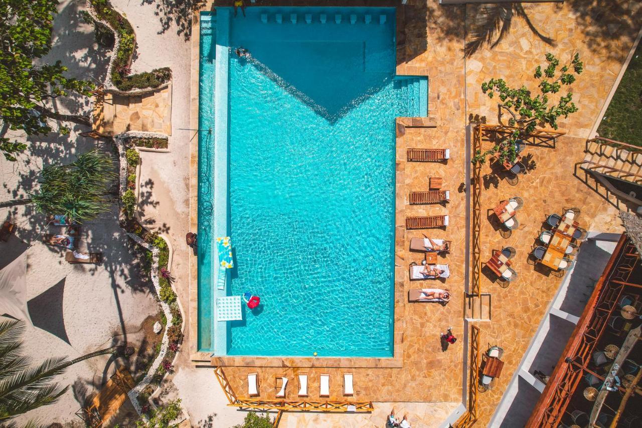Zanzibella Hotel & Spa キウェンワ エクステリア 写真 Aerial view of a swimming pool